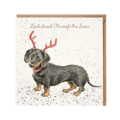 Dachshund with festive red antlers Christmas card